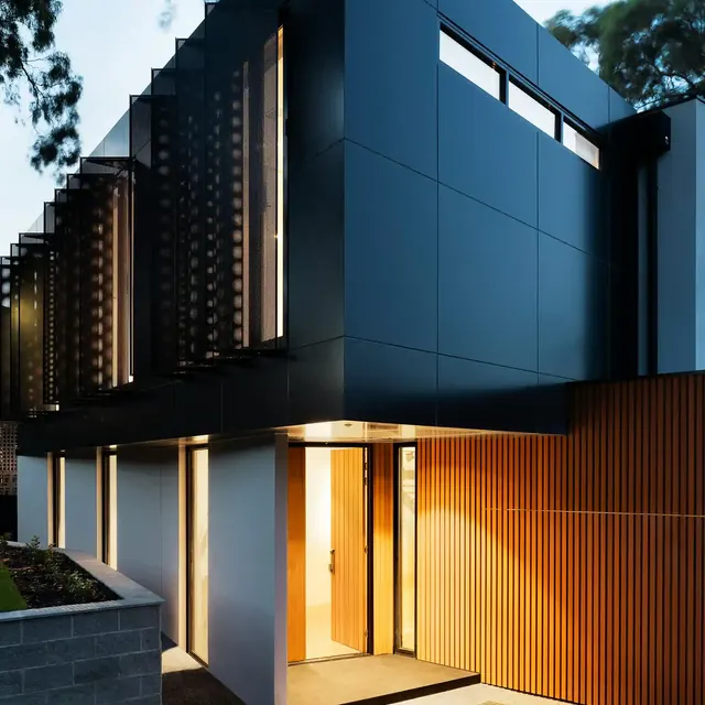 Modern building exterior with warm lighting