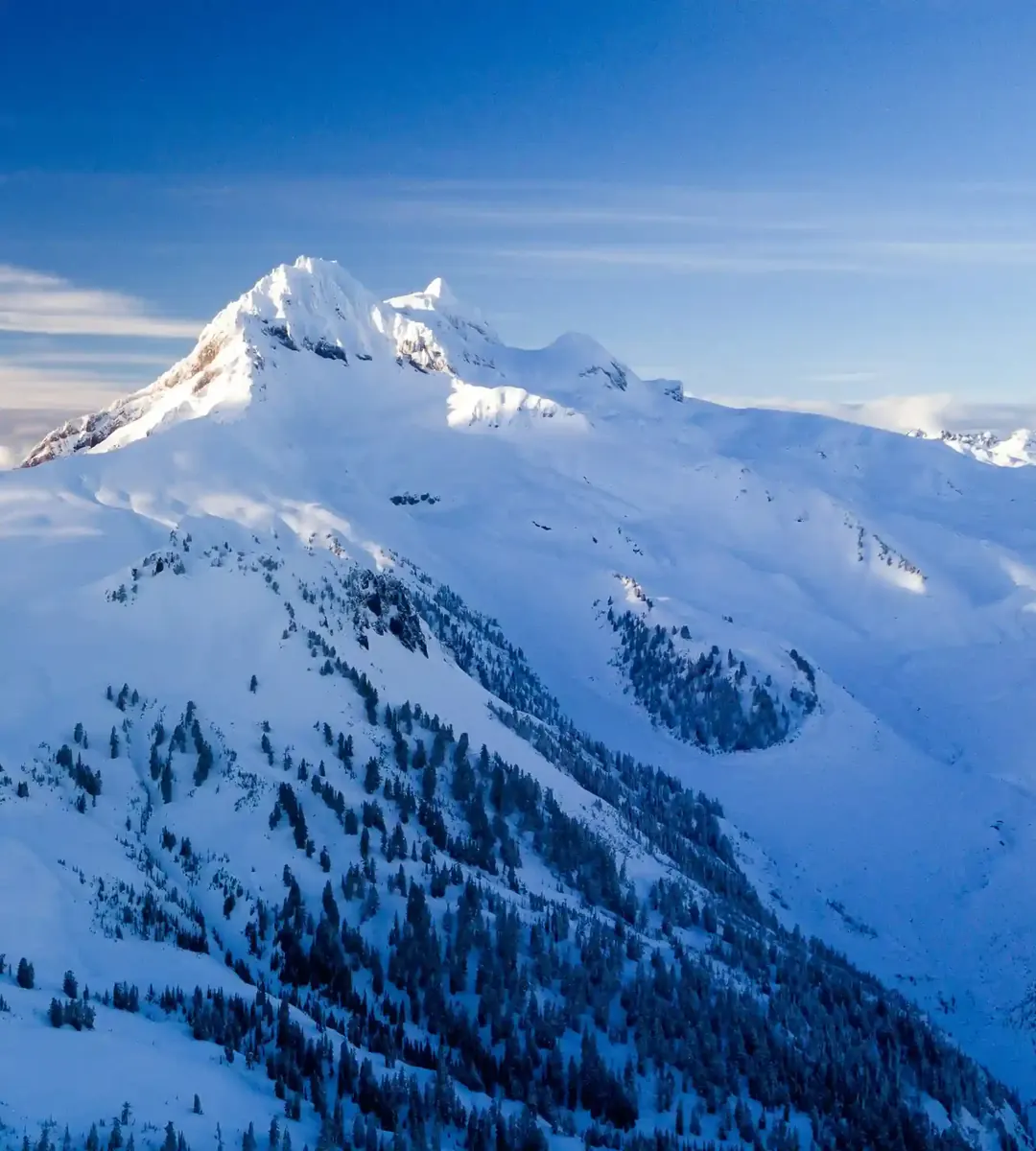 Snow-covered mountain peak from the air