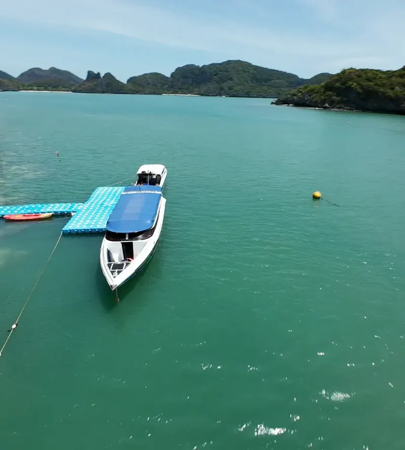 Speedboat moored at a floating jetty in Ang Thong